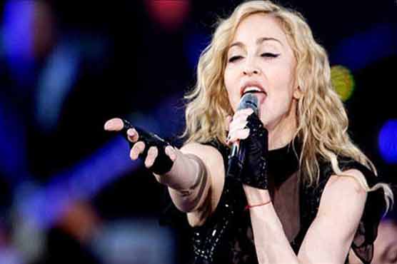 'We will not bend to fear,' Madonna says of Paris attacks
