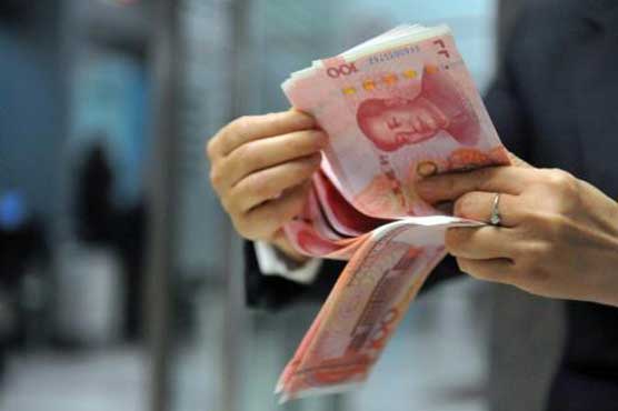 China cuts Yuan to over-four year low vs Dollar