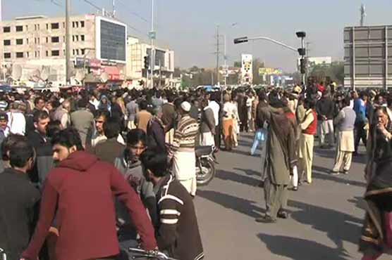 Bereaved family protests while placing bodies on road in Lahore