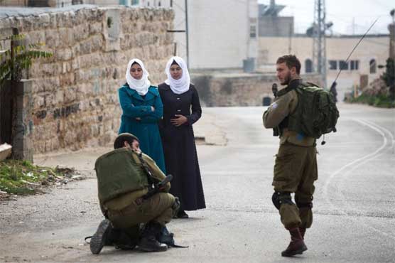 Israeli troops kill 2 Palestinians in West Bank raid