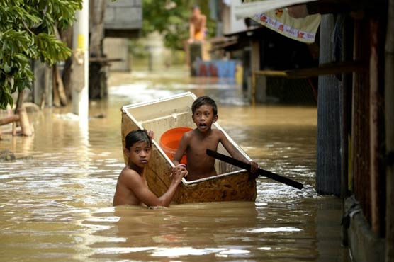Death toll climbs as more floods threaten Philippines