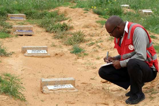 Waiting to leave Libya's 'cemetery of the unknown'