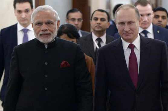 Modi meets Putin in Russia with eye on defence deals