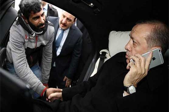 Turkey's Erdogan talks man on bridge out of suicide
