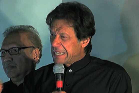 Khan meets enraged Karachi workers, assures fair intra-party polls