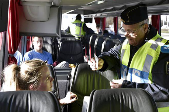 France calls on EU to improve Syrian passport checks 