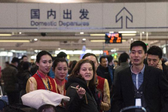 Expelled French reporter's flight leaves China