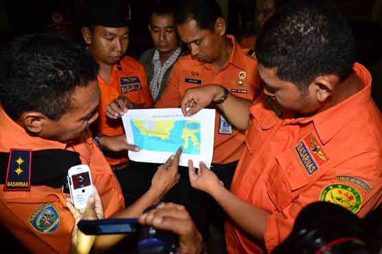 Indonesia resumes search for AirAsia crash victims 