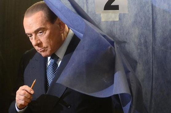 Italy's Berlusconi wins early release from community service