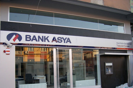 Turkey seizes control of bank linked to president's foe