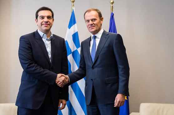 In blow to Greece, ECB restricts banks' access to cash