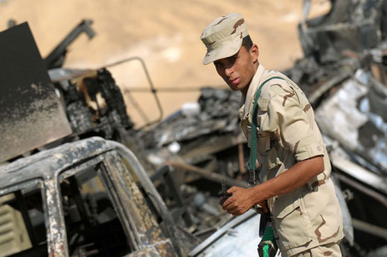 Suicide blast in Libya's Benghazi kills father, son: army