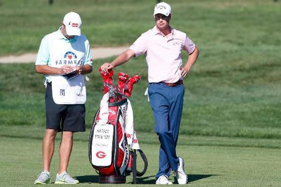 Golf: English leads at Torrey, Mickelson follows Woods out