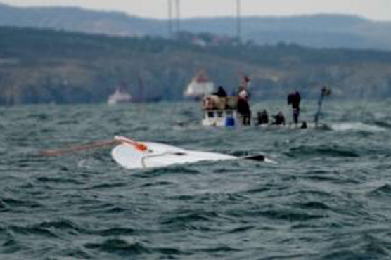 Twelve migrants missing after boat sinks off Turkey: report