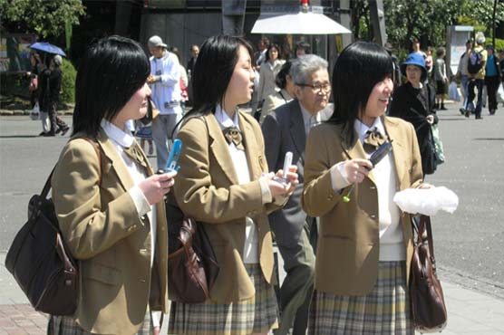 Japan high school girls spend 7 hours on mobiles daily: survey