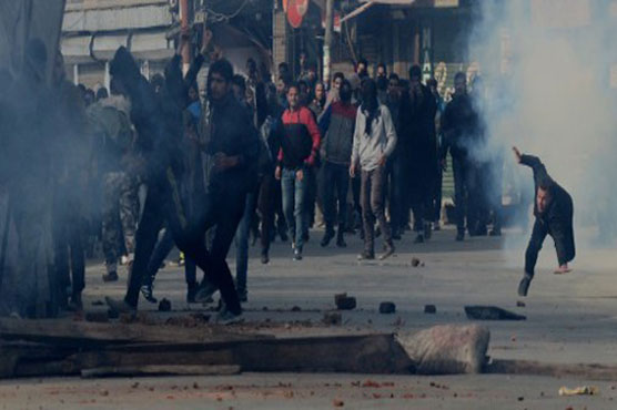 Indian police fire tear gas during protests in Kashmir