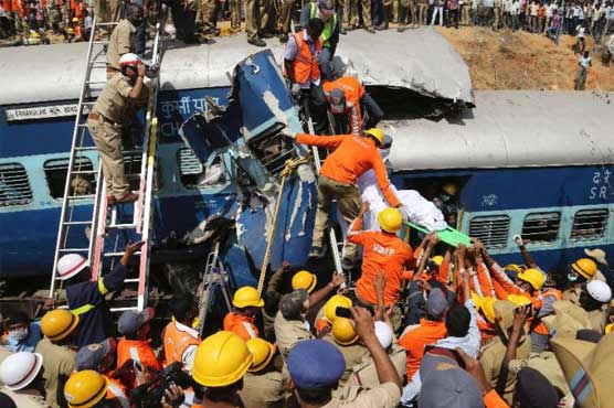 Train derails after hitting boulder in India, killing 11