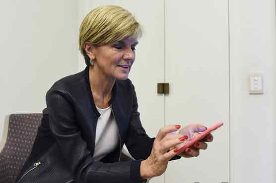 Australian FM uses angry face to describe Putin in emoji interview