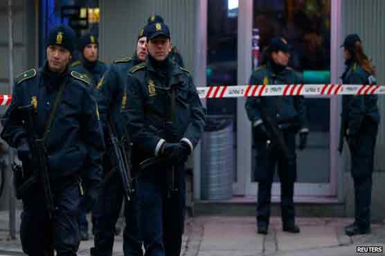 Two men charged with aiding Copenhagen gunman: lawyer
