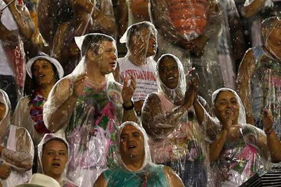 Rain, scandal can't dampen Rio's carnival