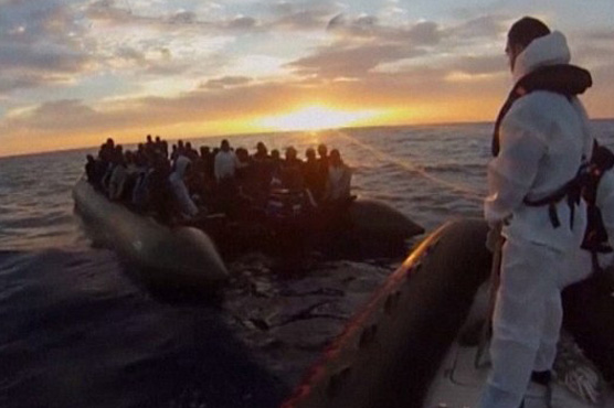 Tiny Italian island swamped by migrant tide