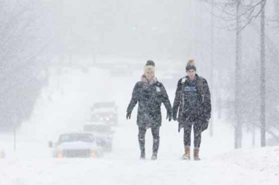 Snow, ice, cold: Winter piles on in eastern US