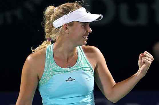 Halep, Wozniacki advance in Dubai championships