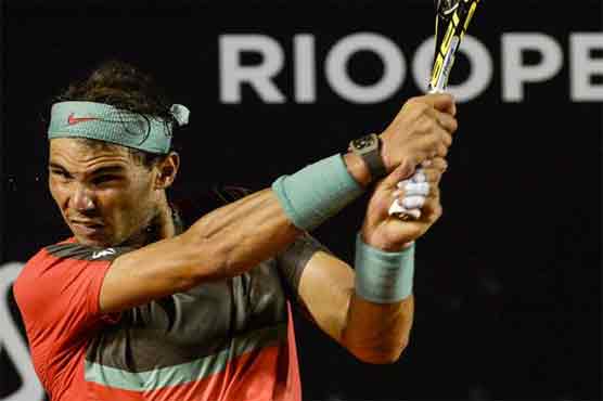 Tennis: Defending champion Nadal advances in Rio 