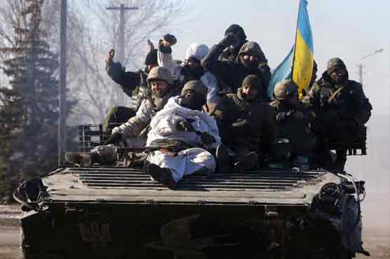 Ukraine calls for peacekeepers after rebels take key town 
