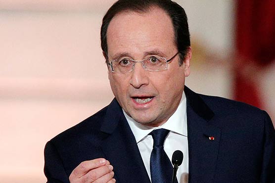 French President says Nuclear deterrent important in 'dangerous world'