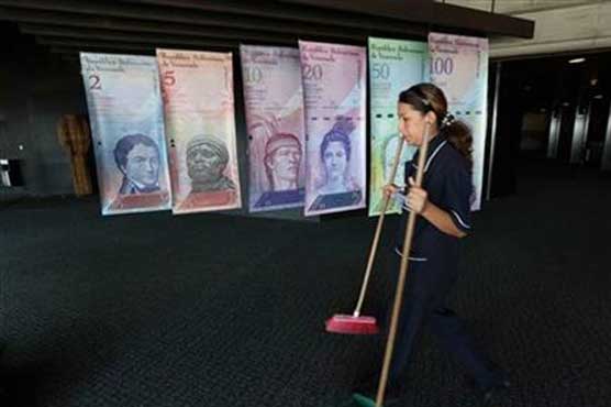 Venezuela allows sale of dollars at near-black market rate