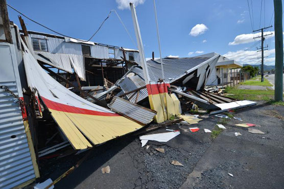 Australia clears up after twin cyclones, more floods expected 