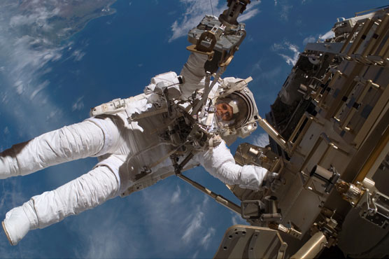 US astronauts prepare spacewalk to lay cable at station