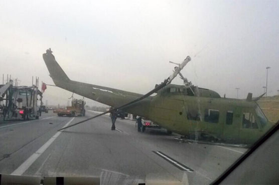 Helicopter being towed by truck tumbles into freeway traffic