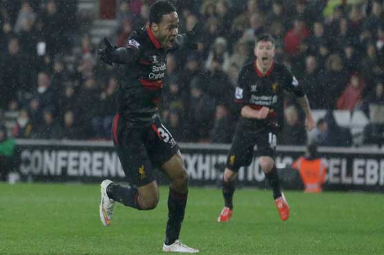 Football: Liverpool survive penalty drama to sink Saints