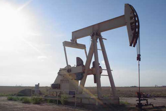 Oil prices extend slide on high supplies