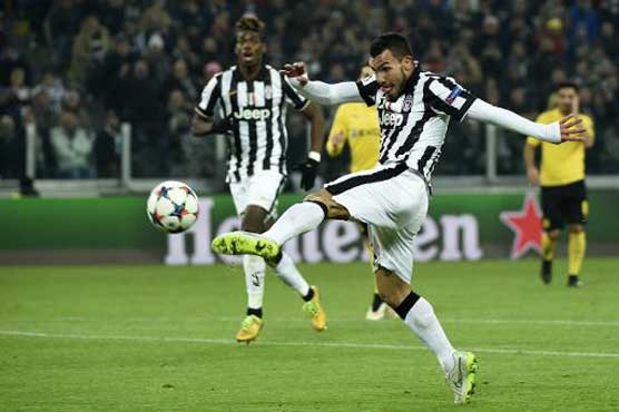 Football: Tevez, Morata strike as Juve battle past Dortmund