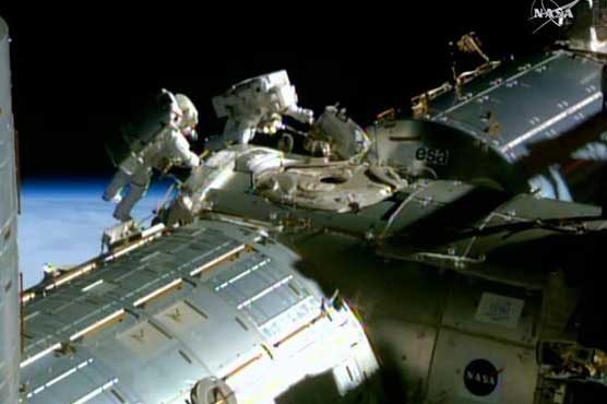 US astronauts step out on spacewalk