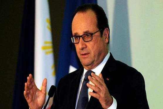 Hollande condemns French lawmakers meeting 'dictator' Assad