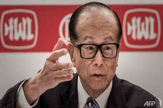 Hong Kong tycoon Li's firms say profits nearly doubled in 2014