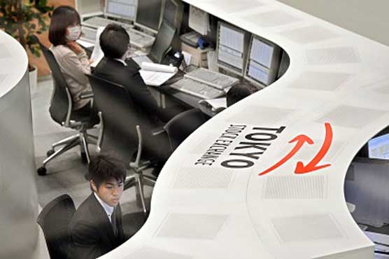 Tokyo stocks hit fresh 15-year high 