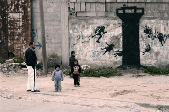 Banksy leaves his mark in war-ravaged Gaza