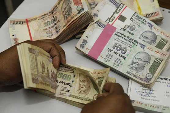 India cuts corporate tax rate to woo bank investors