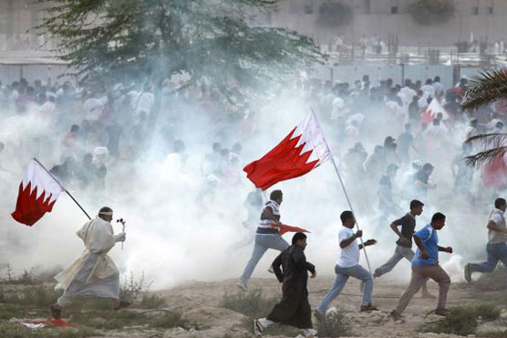 Clash between police and opposition protesters in Bahrain
