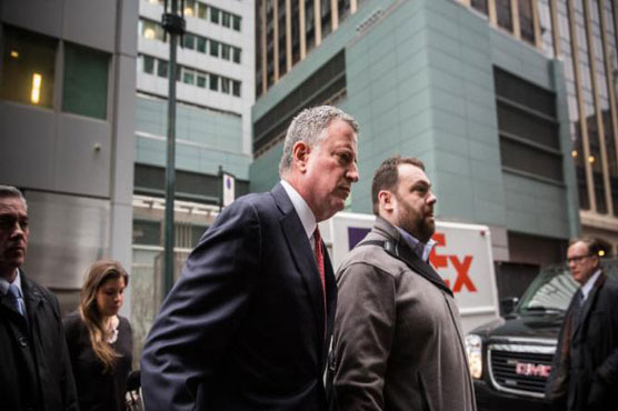 NY police chief urges no protests at funeral for slain cop