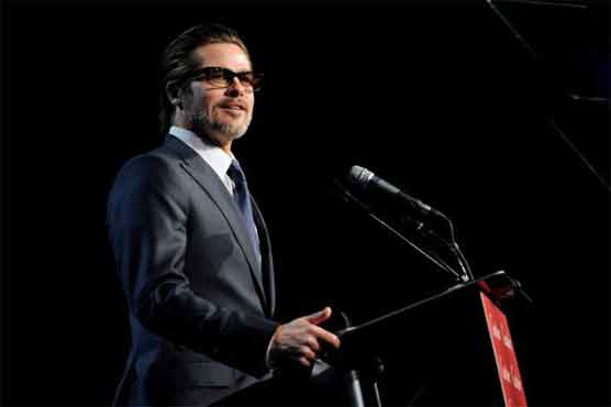 Brad Pitt leads sing-along at film-awards gala