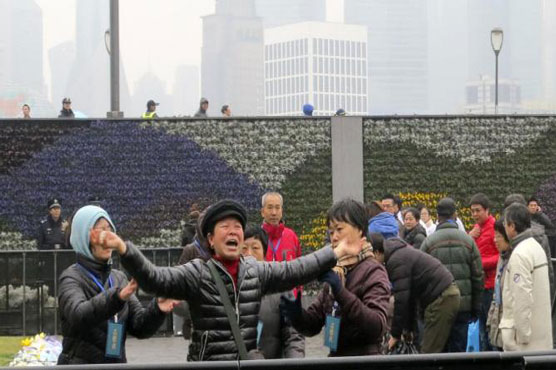 At cost of grieving families, China manages public emotions