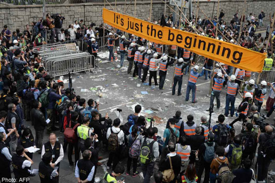 Hong Kong leader warns against protests ahead of reform talks