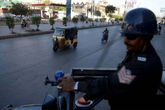 Two policemen among three killed in Karachi gun attacks 