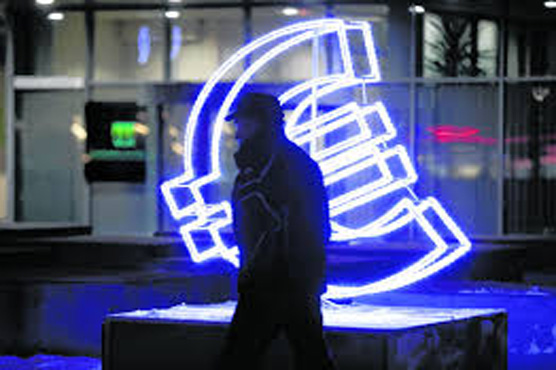 Euro edges up from nine-year low against dollar